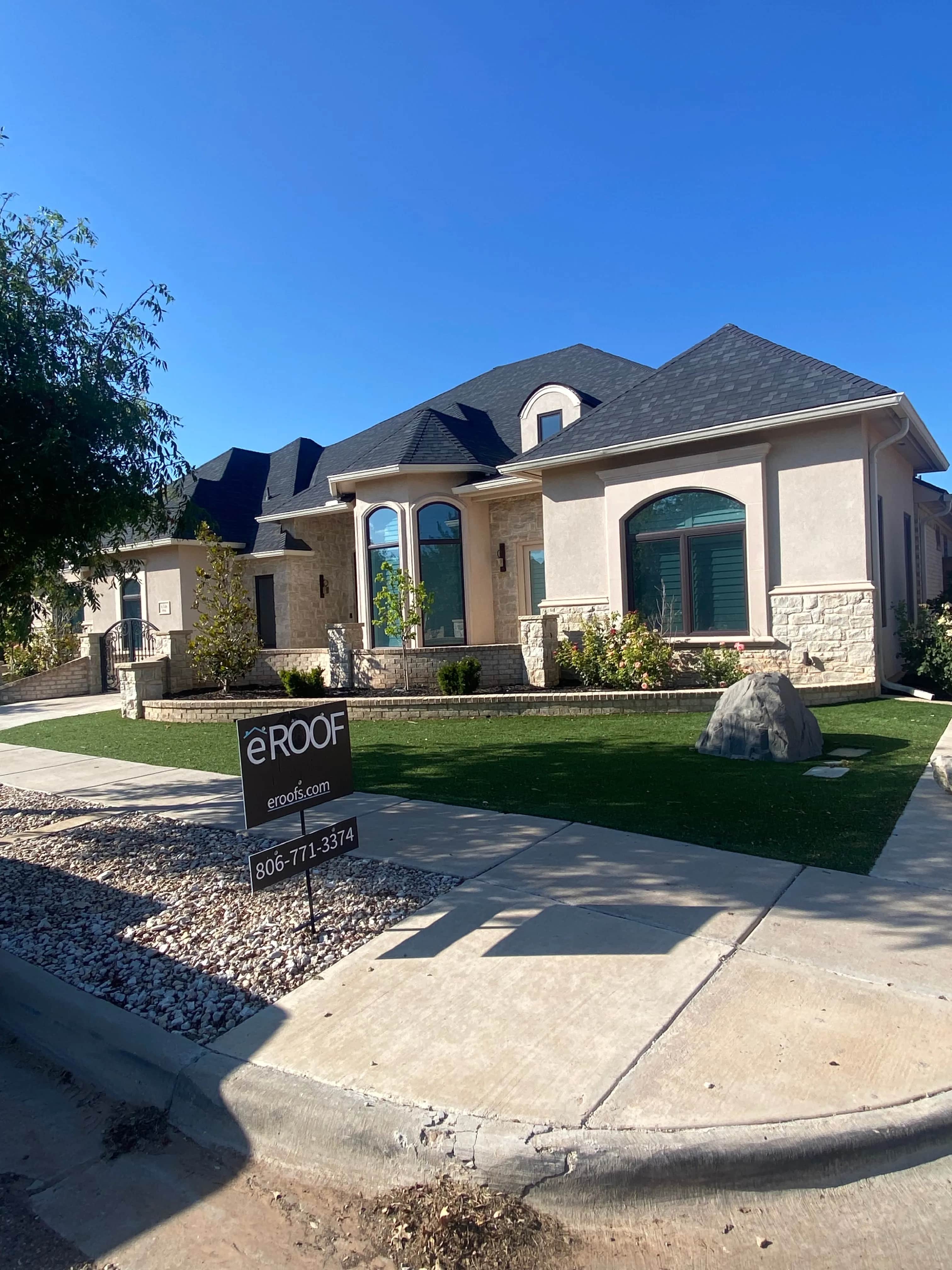 eROOF yard sign in customers front yard.